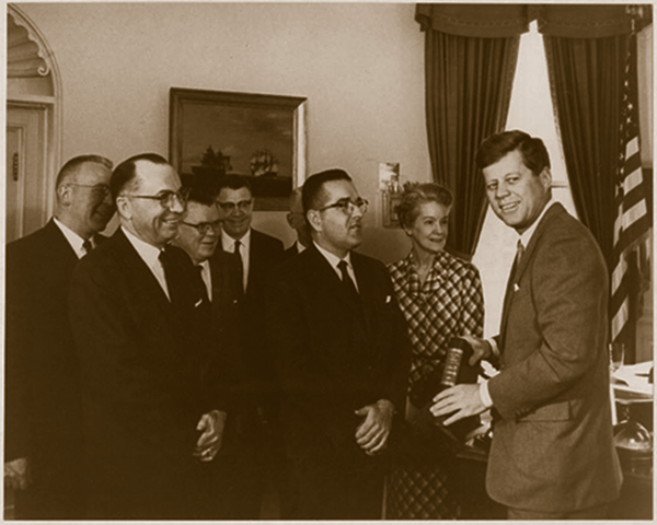 Public Printer James Harrison presented President Kennedy his 1st volumes of the Public Papers of the Presidents